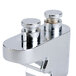 A chrome metal cup support clamp for a Waring drink mixer.