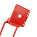 A red plastic Cecilware push handle with a hole in the middle.