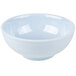 A white bowl with a blue and white design on a white background.