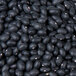 A pile of dried black beans.
