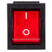 A red switch with a white circle on the top.