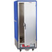 A blue and silver metal Metro C5 hot holding cabinet with a solid door open.