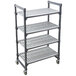 A grey plastic Cambro Camshelving Elements Premium mobile shelving unit with 4 shelves on wheels.