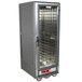 A large gray metal Metro C5 hot holding cabinet with fixed wire slides and a clear door.