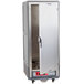 A gray stainless steel Metro C5 hot holding cabinet with a solid door open.