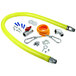 A yellow T&S gas appliance connector hose with installation accessories.