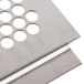 A close-up of a stainless steel Bunn Perforated Clean Tray Cover with holes.