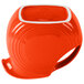 A Fiesta disc pitcher with an orange rim.