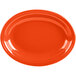 A white China platter with an orange edge.