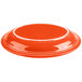 An orange Fiesta china platter with a white border.