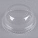 A clear plastic dome lid with a round hole.