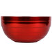 A Fire Engine Red Vollrath beehive serving bowl with a shiny silver rim.