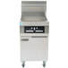 A Frymaster gas floor fryer with stainless steel and wheels.