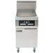 A Frymaster gas floor fryer with stainless steel top and wheels.