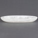 An American Metalcraft white oval bowl on a white surface.