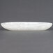 An American Metalcraft Translucence Collection white oval shaped bowl.