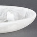 An American Metalcraft Translucence Collection oblong bowl with a swirl design on it.