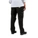 A person wearing Chef Revival black cargo chef pants.