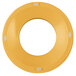 A yellow plastic circle with white dots on a white background.