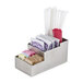 An American Metalcraft stainless steel bar caddy holding different types of sugar packets.