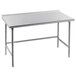 An Advance Tabco stainless steel work table with a backsplash on legs.