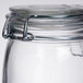 An American Metalcraft glass apothecary jar with metal hinged lid and ring.