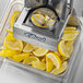 An Edlund Titan Max-Cut Dicer with lemons in it.