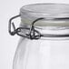 An American Metalcraft glass miniature apothecary jar with a metal hinged lid and ring.