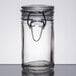 An American Metalcraft clear glass miniature hinged apothecary jar with a metal lid.