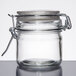 An American Metalcraft miniature apothecary jar with a metal lid.