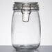 An American Metalcraft glass apothecary jar with a metal hinge lid.