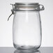 An American Metalcraft clear glass hinged apothecary jar.
