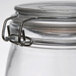 An American Metalcraft glass apothecary jar with metal handles.