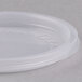 A Solo clear polypropylene lid on a plastic container.