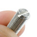A close-up of a Waring set screw with a small hole.