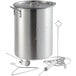 A Backyard Pro aluminum stock pot with lid and accessories including a thermometer and a syringe.