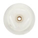 A white plastic Waring bearing holder disc with a hole in the center.