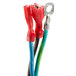 A pair of wires with red and green connectors.