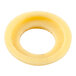 A close up of a round yellow Waring bearing cap.