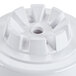 The top housing for a Waring juicer, a white plastic container with a hole in it.