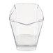 A clear plastic juice container with a curved edge and a handle.
