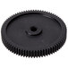 A black plastic gear with a hole in the center.