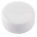 A white round plastic cap with a hole in the center.