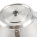 A stainless steel Waring filter strainer with a metal lid.