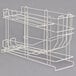 A white wire rack for MetroMax iQ shelving with several shelves for #5 or #10 cans.