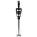 A black and silver Waring Immersion Blender.