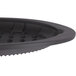 A black oval silicone underliner with a round edge and holes in it.