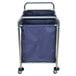 A blue Luxor industrial laundry cart with wheels.