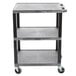 A Luxor grey plastic utility cart with three shelves and black metal legs.