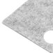 A gray felt pad with a hole in it.